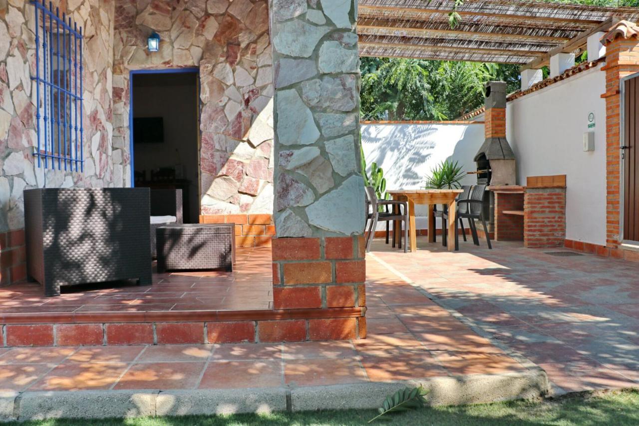 Bungalow La Roa con piscina comunitaria y privada Conil De La Frontera Esterno foto